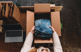 ep archivo   a millennial woman is preparing the shipment of some clothes in her new online shop