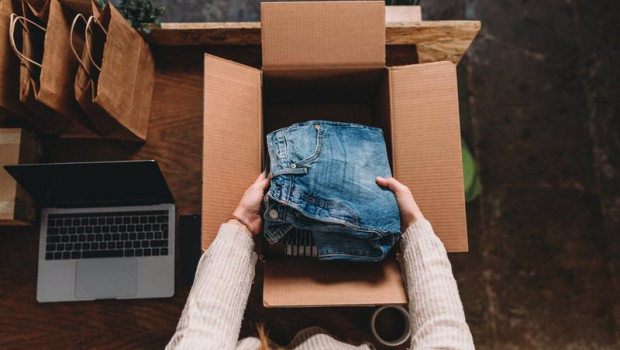 ep archivo   a millennial woman is preparing the shipment of some clothes in her new online shop