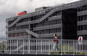 ep una persona camina al lado de la sede de vodafone en madrid el dia en el que la compania de