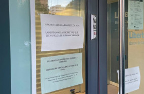 ep oficina de liberbank unicaja en titanes madrid cerrada por la huelga general del 26 de noviembre