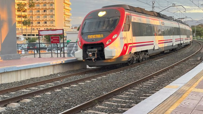 ep tren de cercanias de renfe de la linea c 1 llega a la parada apeadero de los alamos en ep tren de cercanias de renfe de la linea c 1 llega a la parada apeadero de los alamos en