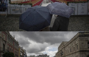 ep jueves santo 2019 el entorno de la plaza de san francisco solo se veian paraguas pues la lluvia