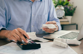 businessman using calculator and calculating bills 2023 11 27 05 16 19 utc 