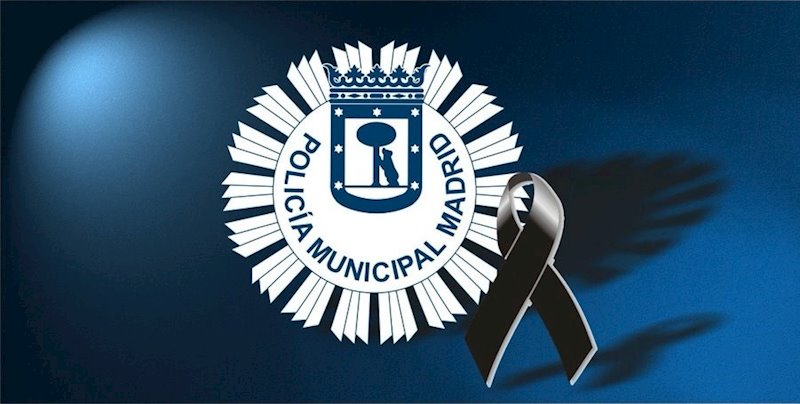 ep escudo de la policia municipal de madrid con un crespon negro