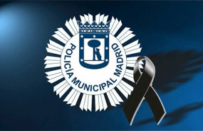 ep escudo de la policia municipal de madrid con un crespon negro