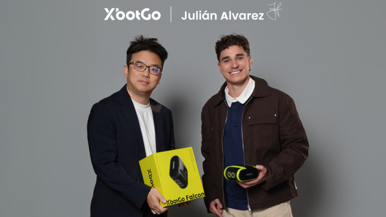 XbotGo CEO and Founder David Tan gifting a Falcon to Julián Alvarez david and julian 20260603140609