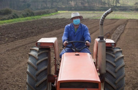 ep archivo   un hombre ara sus fincas con el tractor en lugo galicia
