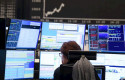 ep main a stock trader watches her monitors on the trading floor of the frankfurt stock exchange