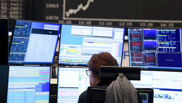 ep main a stock trader watches her monitors on the trading floor of the frankfurt stock exchange