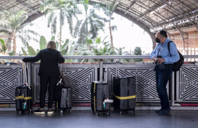 ep archivo   viajeros con maletas en la estacion puerta de atocha a 29 de abril de 2022 en madrid