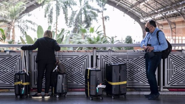 ep archivo   viajeros con maletas en la estacion puerta de atocha a 29 de abril de 2022 en madrid