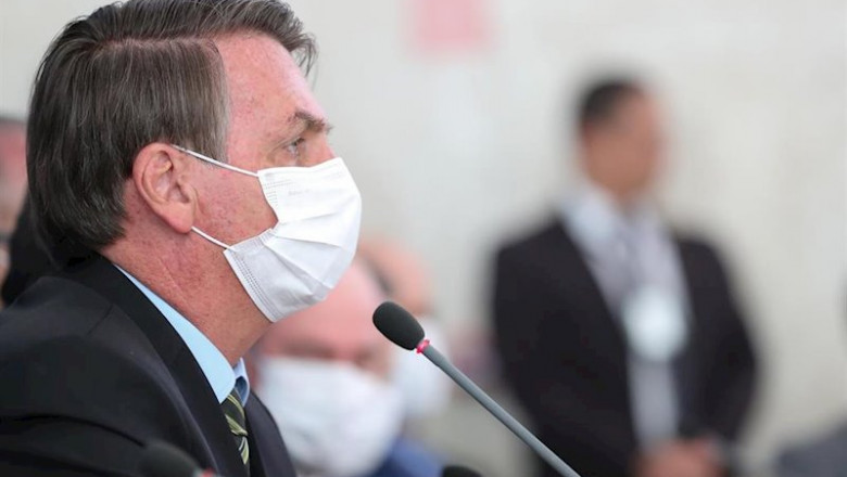 El presidente de Brasil, Jair Bolsonaro, con mascarilla por el coronavirus | Marcos Correa/Prensa Planalto/dp / DPA ep el presidente de brasil jair bolsonaro con mascarilla por el coronavirus