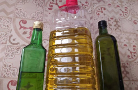 ep archivo   aceite de oliva envasado en garrafa de platico y botellas de vidrio