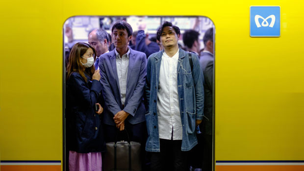 dl japan tokyo metro passengers commuters workers salarymen city transport nikkei 225 tokyo stock exchange asia report unsplash